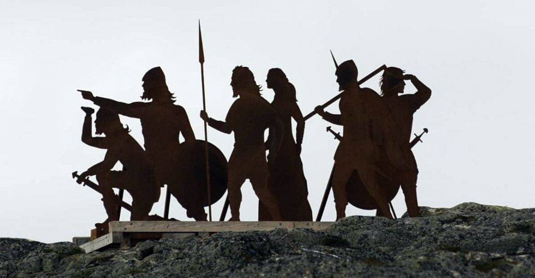 Literally-Metal Vikings greet tourists as they enter L'anse Aux Meadows, in Newfoundland. Photo by Douglas Sprott, https://flic.kr/p/bweQV5.